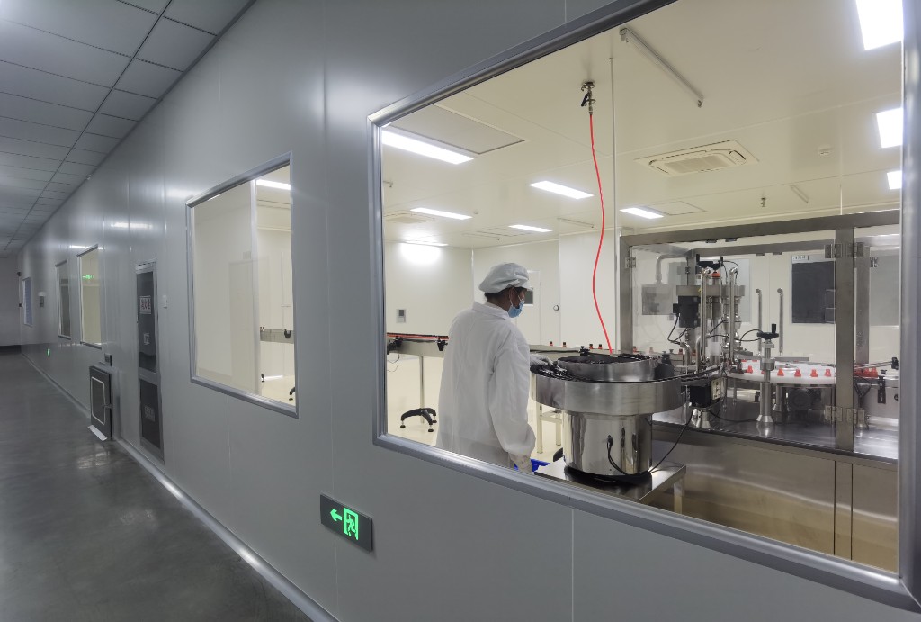 Automated bottling production line in cleanroom